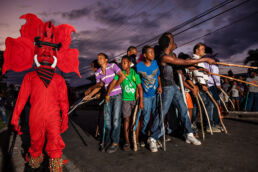 Red Devils frighten children during Carnival in Bocas del Toro, Panama.