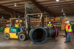 Transporting a large pipe at the Wolseyley Industrial Group, Industrial photography Lakeland, Florida by Tampa based commercial photographer Carver Mostardi.