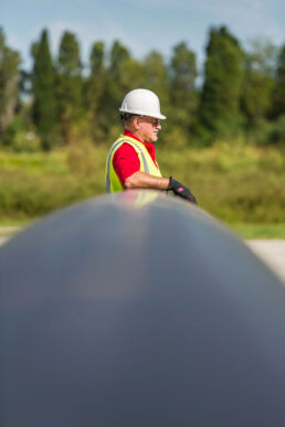 Loading pipes at the Wolseyley Industrial Group, Industrial photography Lakeland, Florida by Tampa based commercial photographer Carver Mostardi.