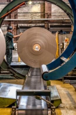 Industrial photo of recycled paper production at Paperworks Industries in Philadelphia, PA by Tampa construction photographer Carver Mostardi.