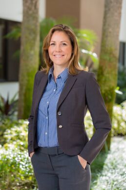 Corporate portrait of female engineer standing outside her office in Boca Raton, Fl.